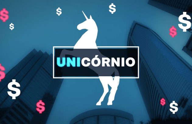 Silhueta de unicórnio branco com texto UNICÓRNIO. Cifrões de dólar e prédios em fundo azul escuro, simbolizando startups.