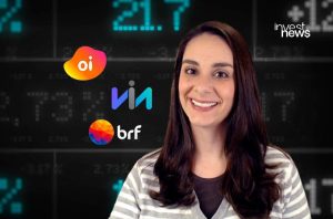 Mulher sorrindo com fundo financeiro exibindo dados e logos de Oi, Via, BRF e InvestNews, sugerindo análise de mercado.