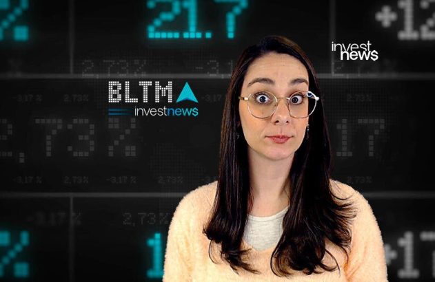 Mulher com óculos e olhos arregalados em estúdio de notícias financeiras, com números e o logo InvestNews ao fundo.