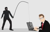 Um hacker com vara de pesca e anzol mira um laptop. Representa um ataque de phishing.