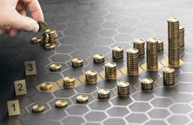 Pilhas de moeda representando a rentabilidade