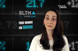 Mulher reage a dados financeiros na tela com o alerta: "TODO MUNDO EM QUEDA!".