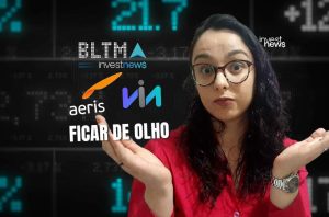 Mulher com óculos, expressão de espanto, em fundo de tela com dados financeiros. Logos e texto 'FICAR DE OLHO'.