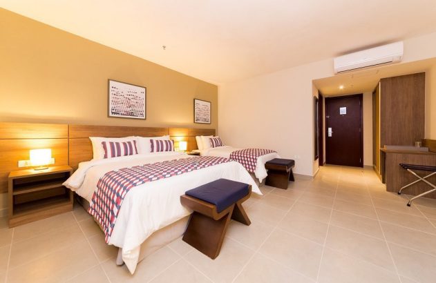 Foto de quarto de hotel em matéria sobre o setor de turismo