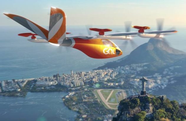 eVTOL GOL laranja voando sobre o Rio de Janeiro, com Cristo Redentor e montanhas.