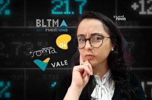 Mulher pensativa em frente a um painel de mercado financeiro com logos de empresas.