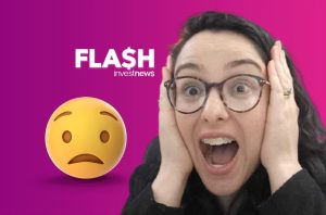 Mulher chocada, mãos no rosto, boca aberta. Ao lado, emoji triste e logo 'FLASH investnews'.