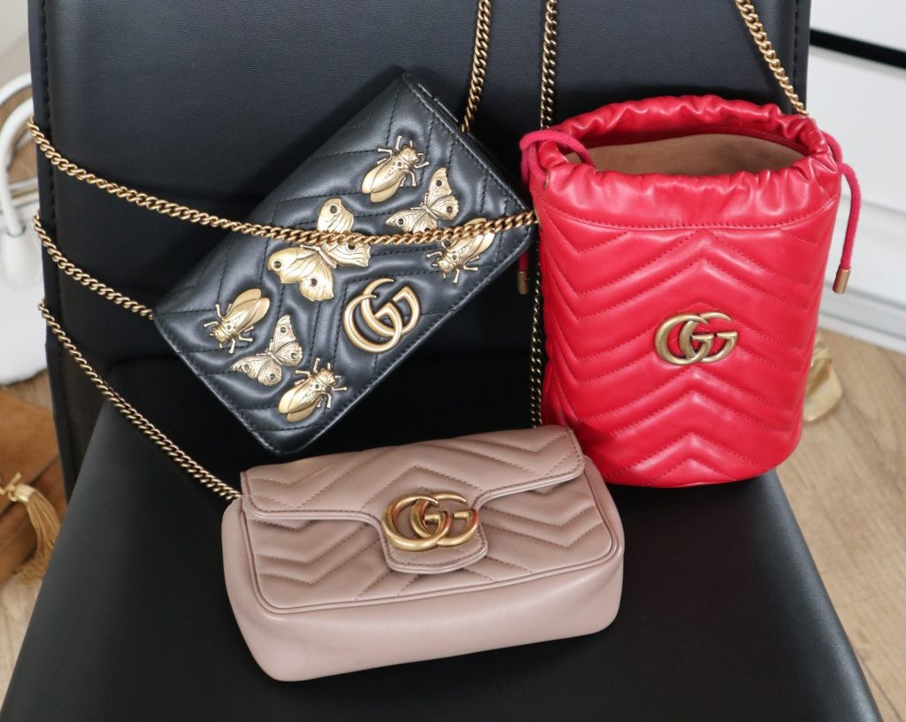 bolsas de luxo na cor bege, vermelha e preta