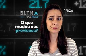 Apresentadora da Investnews, com expressão confusa, pergunta "O que mudou nas previsões?" contra fundo digital financeiro.