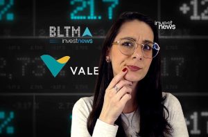 Mulher pensativa de óculos, diante de tela com dados financeiros e logos de empresas (BLTMA, VALE).