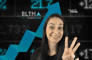 Mulher sorridente com 3 dedos levantados, sobre gráfico financeiro de alta com logo InvestNews. (119 caracteres)