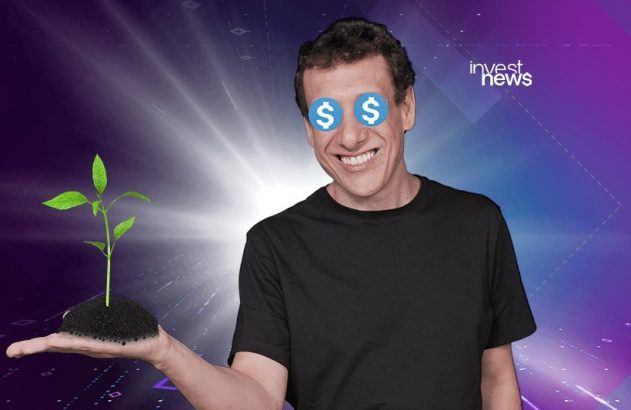 Samy Dana com uma muda de planta na mão