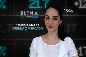 Mulher em estúdio de notícias financeiras com texto 'Guerra x Mercado' e logo Investnews.