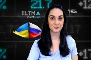 Apresentadora Investnews sobre impacto financeiro da guerra Ucrânia-Rússia. Dados de mercado e bandeiras.