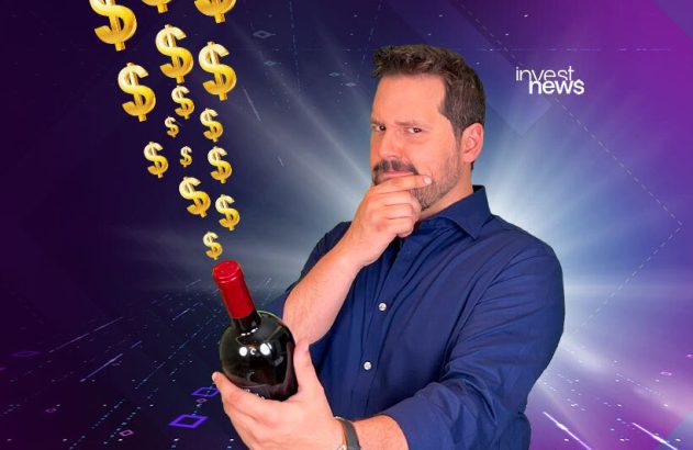 Dony De Nuccio com garrafa de vinho