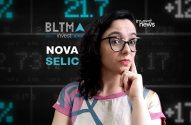 Mulher de óculos, mão no queixo, diante de tela financeira com 'NOVA SELIC' e logos 'investnews'.