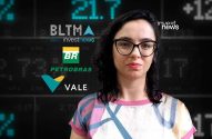 Mulher em frente a tela digital com dados financeiros e logos (Petrobras, Vale, Investnews).