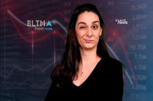 Mulher sorri e pisca à frente de gráficos e dados financeiros com logos BLTMA e Investnews.