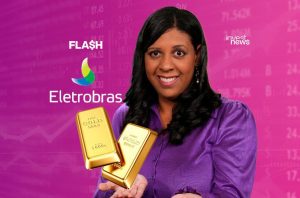 Mulher sorridente apresenta barras de ouro sobre fundo financeiro com logos "Eletrobras" e "invest news".