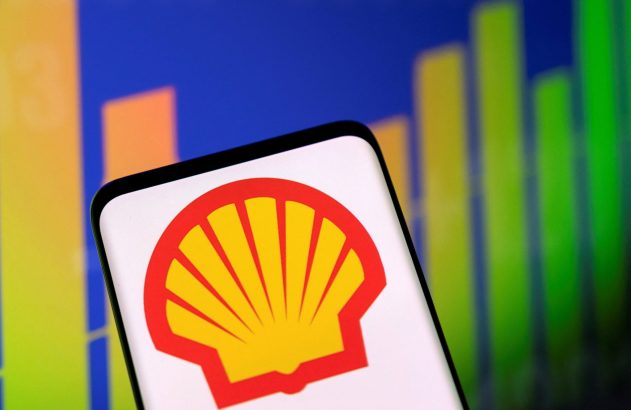 Tela de celular exibe logotipo da Shell com gráfico de barras coloridas ao fundo.
