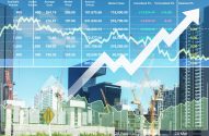 A imagem mostra alguns edifícios em construção em uma cidade. Sobreposto a imagem, há uma tabela e um gráfico que mostram a variação da cotação dos tipos de fundos imobiliários. (Foto: Shutterstock / Ekapol Sirachainan)