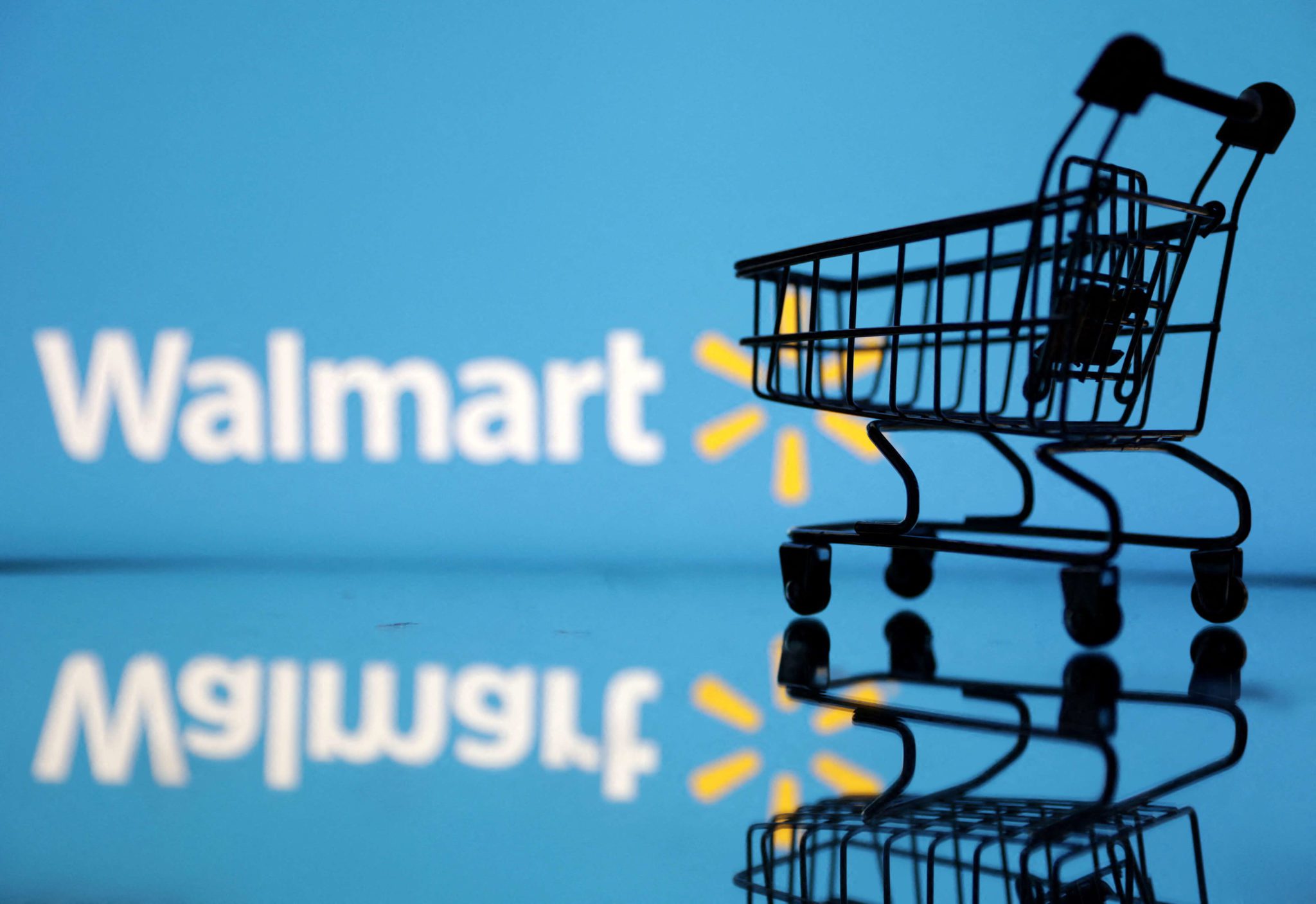 logotipo do Walmart com um carrinho na frente