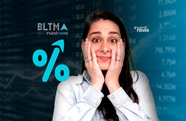 Mulher surpresa com mãos no rosto, diante de um gráfico financeiro e um grande símbolo de porcentagem em alta.