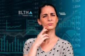 Mulher confusa analisa gráficos financeiros e dados de mercado com logo Investnews.