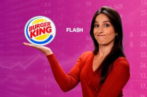 Mulher com expressão curiosa segura logo do Burger King na palma da mão, em fundo roxo com dados financeiros e 'FLASH'.