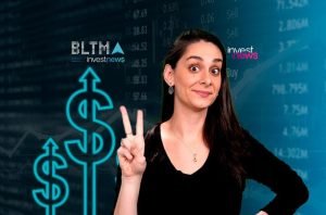 Mulher sorrindo faz sinal de V, com cifrões neon e fundo de dados financeiros. Sugere crescimento em investimentos.