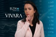 Mulher pensativa olhando para dados financeiros, com logos BLTMA investnews e Vivara.