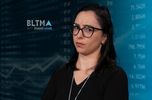Mulher de óculos, expressão questionadora, em frente a dados e gráficos de mercado, com logo BLTMA investnews.