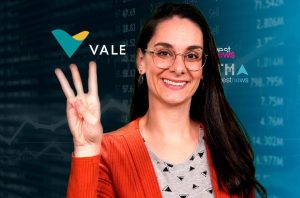 Mulher sorridente exibe três dedos, com logos VALE e Investnews e dados financeiros ao fundo.