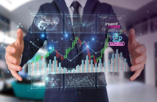 Executivo com gráfico nas mãos