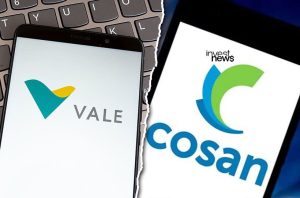 Dois apresentadores, um com camiseta "MATHFLIX", posam em estúdio com laptops.