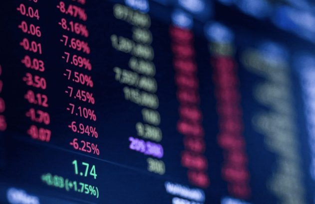 A imagem mostra um painel com gráficos de ações simbolizando as funções de stop loss e stop gain que auxiliam no controle de perdas e ganhos de investimentos. (Foto: Adobe Stock / Sackshai)