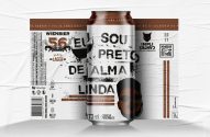 Lata de cerveja branca com "Eu Sou Preto de Alma Linda" e rosto, celebrando a Consciência Negra.