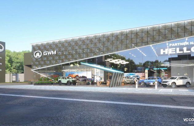 Concessionária GWM moderna com fachada de vidro, exibindo veículos Haval, Poer e Tank. Vista da rua.