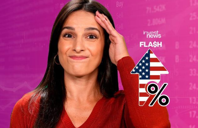 Mulher de suéter vermelho com mão na testa. Ao fundo, dados financeiros e seta com bandeira dos EUA e símbolo de %. Notícia: "Invest News FLASH".