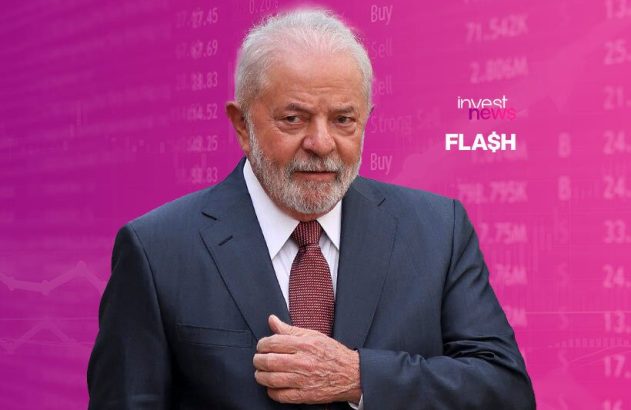 Lula, de terno e barba, olhando à frente, em um fundo com dados financeiros e o logo 'invest news FLASH'.