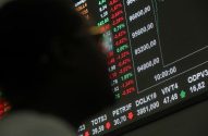 Tela exibindo dados de mercado em tempo real, com cotações de ações.