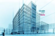 Prédio moderno em projeto arquitetônico digital, com contornos wireframe azuis.