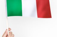 Person waving the flag of Italian Republic