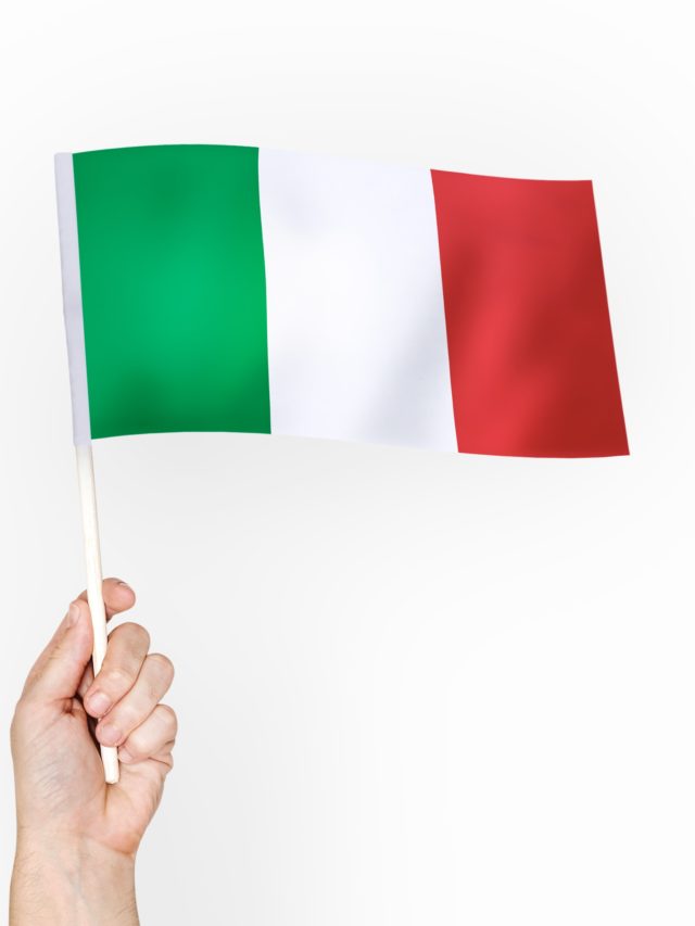 Person waving the flag of Italian Republic