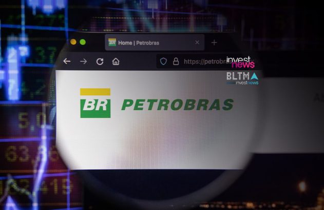 Lupa sobre tela exibindo site da Petrobras (logo BR PETROBRAS) com gráficos financeiros ao fundo.