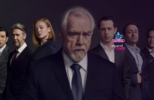 Homem de terno e barba, com olhar sério, lidera um grupo de seis pessoas em fundo escuro.