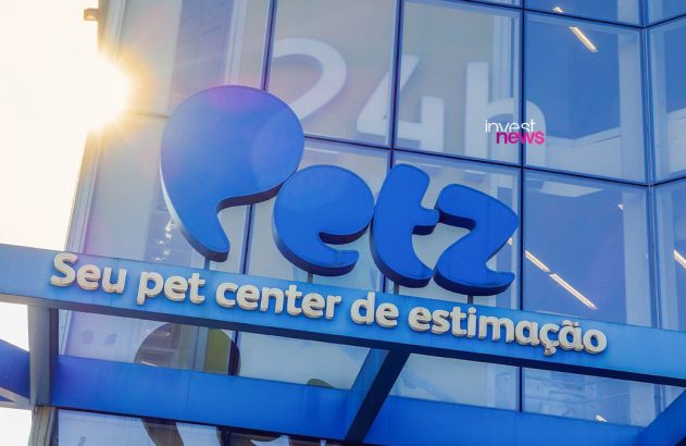 Letreiro azul Petz e 'Seu pet center de estimação' em prédio de vidro com '24h'.