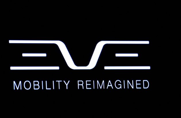 Logotipo estilizado 'EVE' e texto 'MOBILITY REIMAGINED' em branco sobre fundo preto.