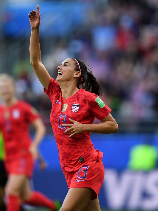 Alex Morgan scores a and celebrates her goal