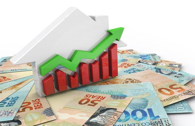 Casa branca com gráfico de crescimento e notas de Reais.